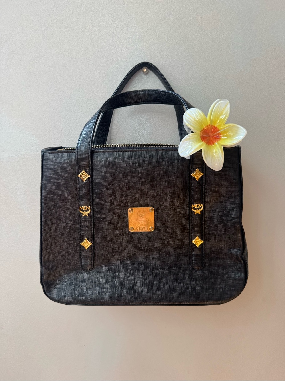 MCM Black Satchel with Gold Plaque and Stud Accents